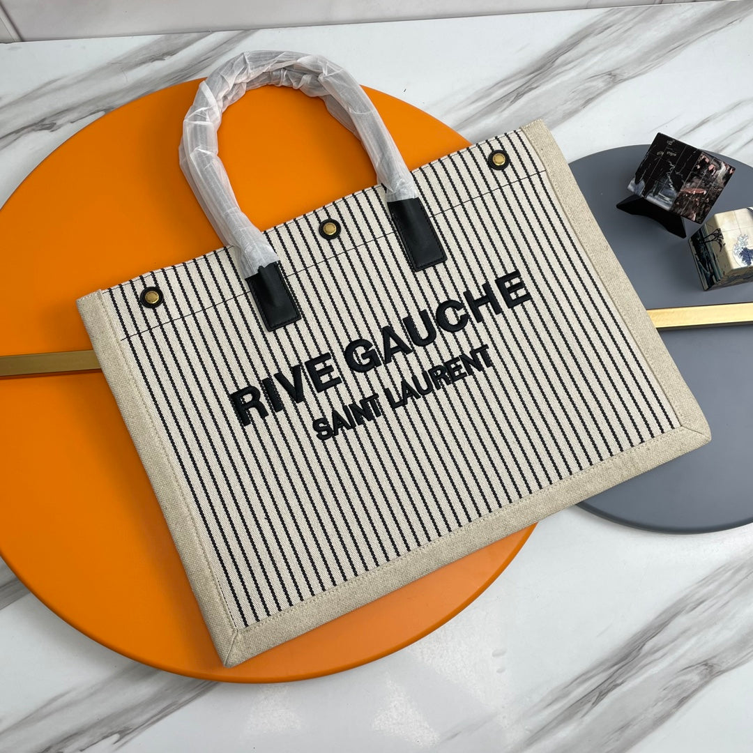 Rive Gauche Tote Ivory Black Canvas Leather Trim 286033