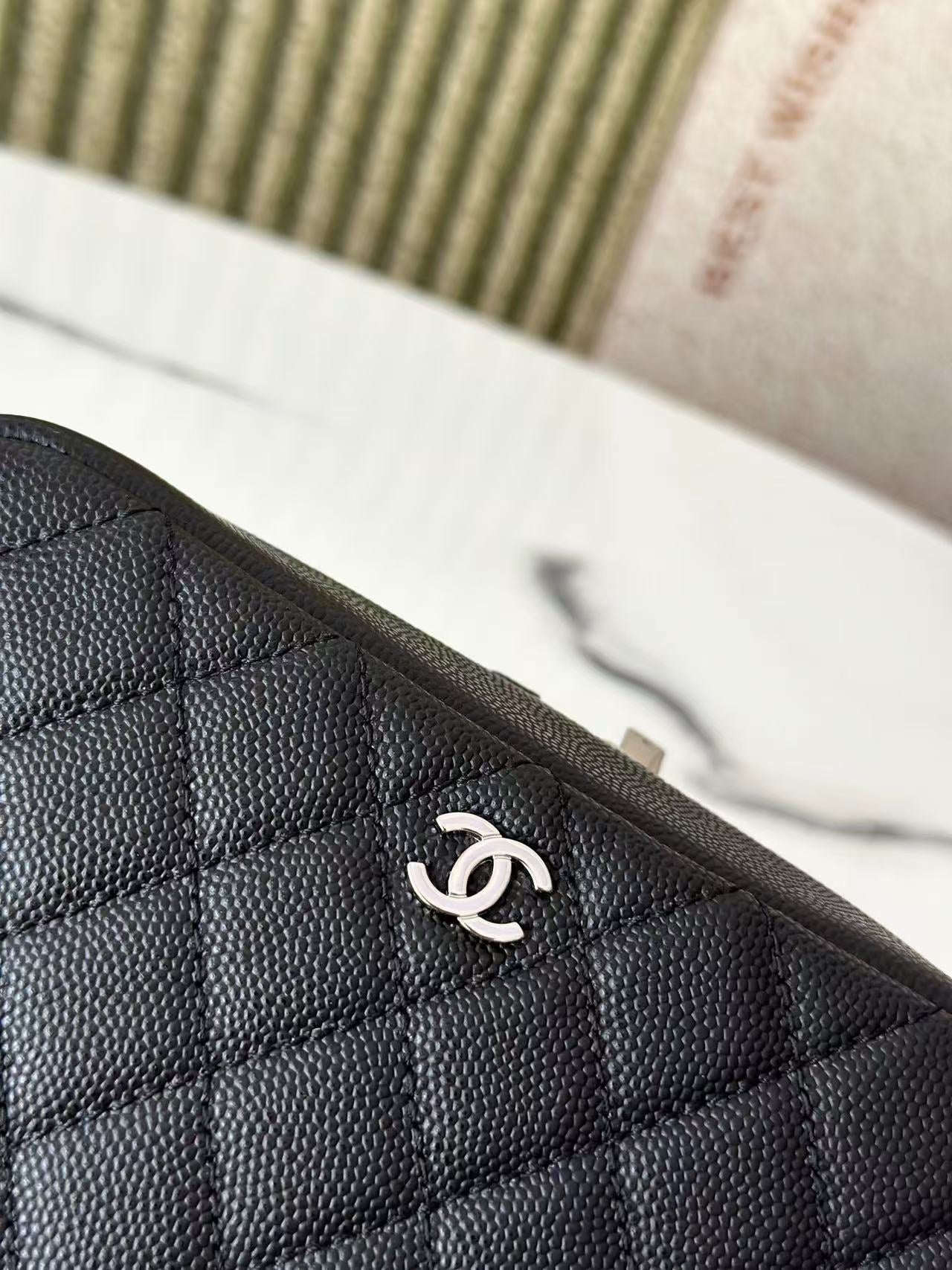 Chanel 2026 Quilted Medium Curvy Pouch Black Caviar Leather