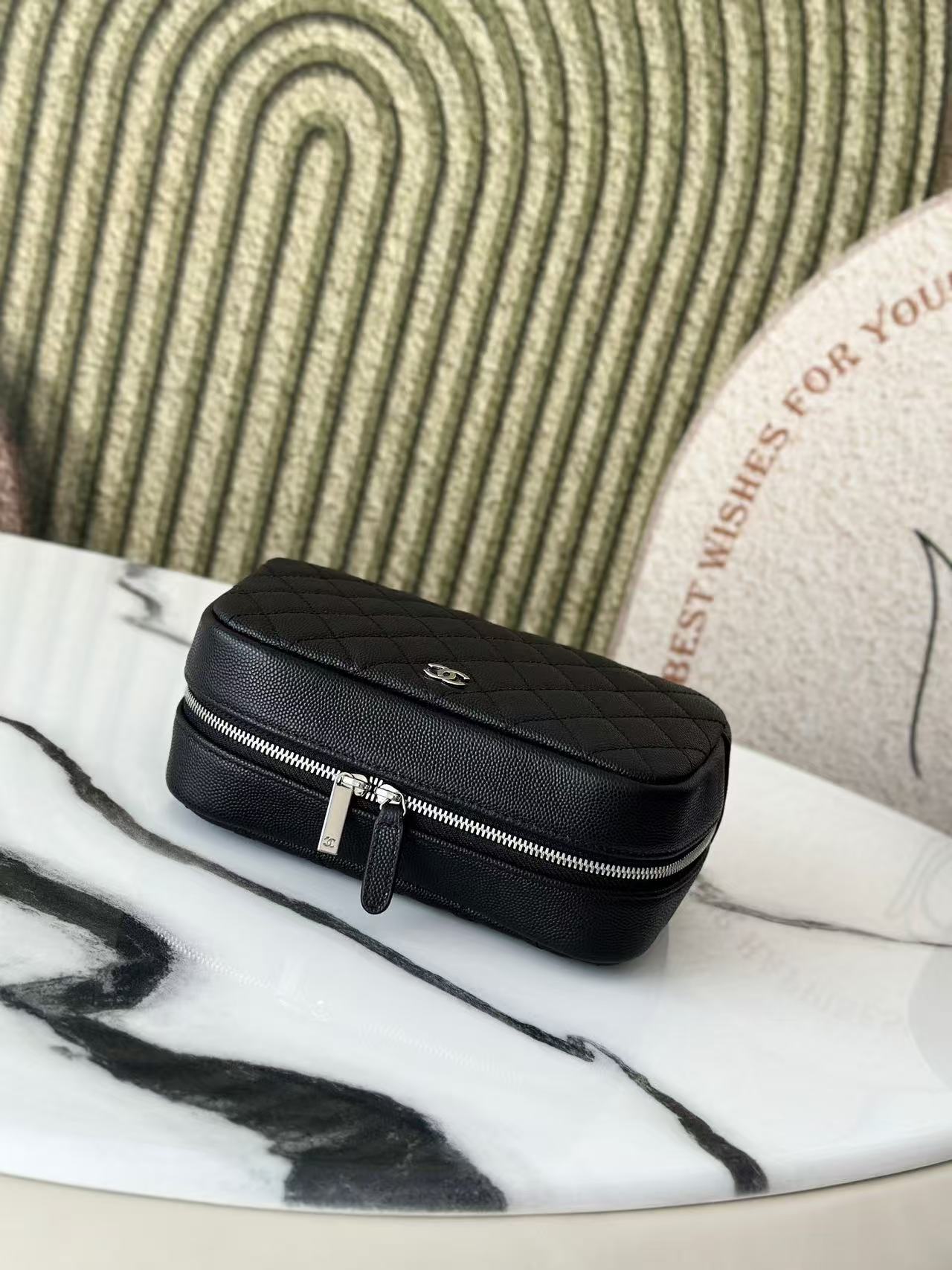 Chanel 2026 Quilted Medium Curvy Pouch Black Caviar Leather
