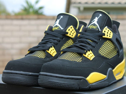 Air Jordan 4 Retro Thunder 2012 Sneakers - Modern Classic