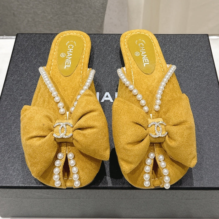 Chanel 2026  Pearl Bow Flat Slipper Suede Sheepskin 713038