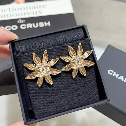Chanel Light Gold Sunflower Earrings
