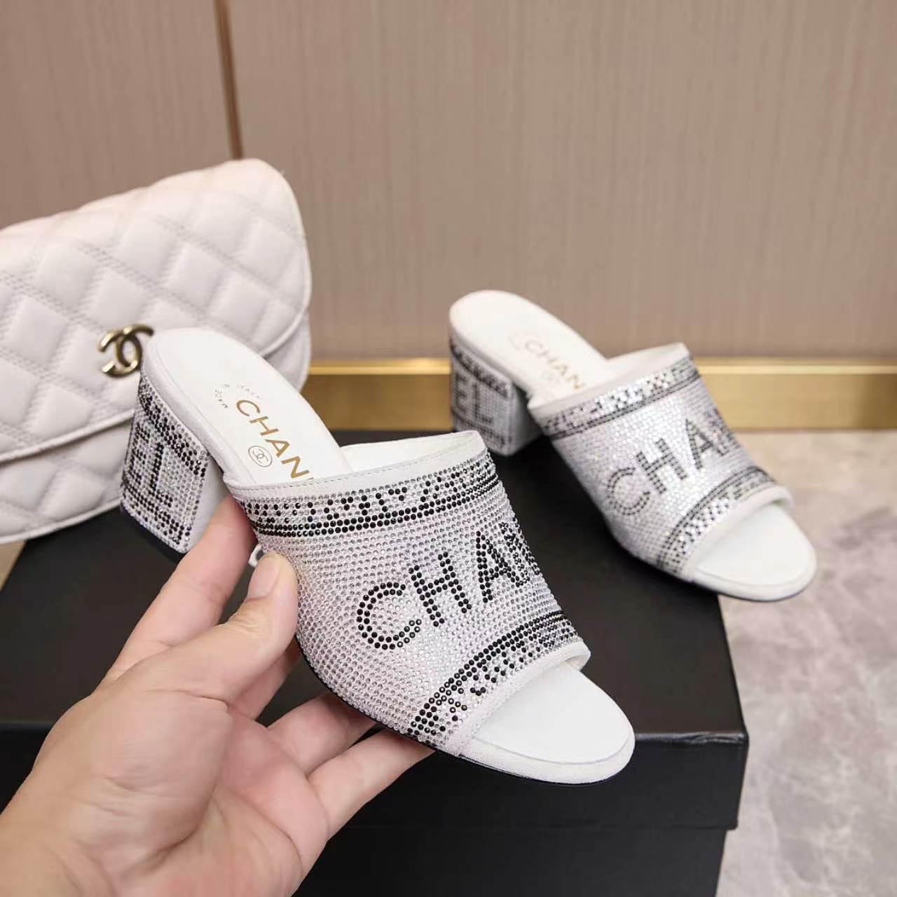 Chanel 2026 Rhinestone Mules Block Heel And Lettered Design Leather 778400