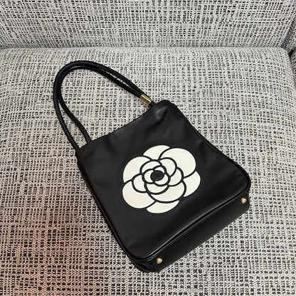 Chanel 2026 Camellia Letter Reversible Tote Bag 25cm Black White Leather