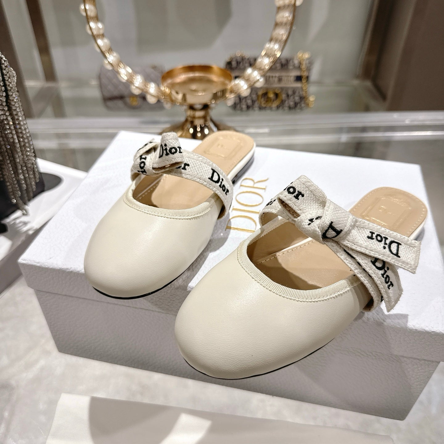 CD 26 Bow Flat Mules Embroidered Sheepskin