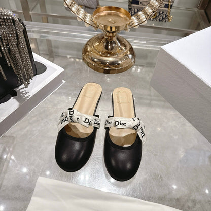 CD 26 Bow Flat Mules Embroidered Sheepskin
