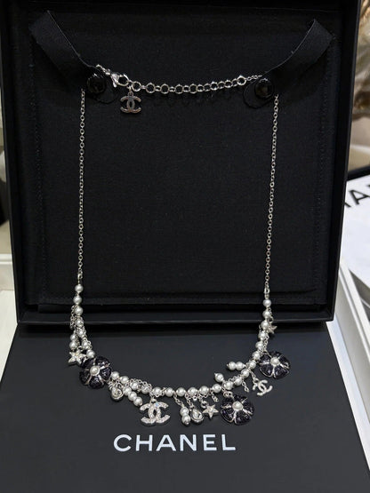 Chanel 2026 Silver Double C Black Flower Pearl Tassel Necklace
