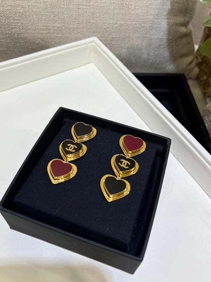Chanel 2026 Gold Double C Black Heart Enamel Long Stud Earrings