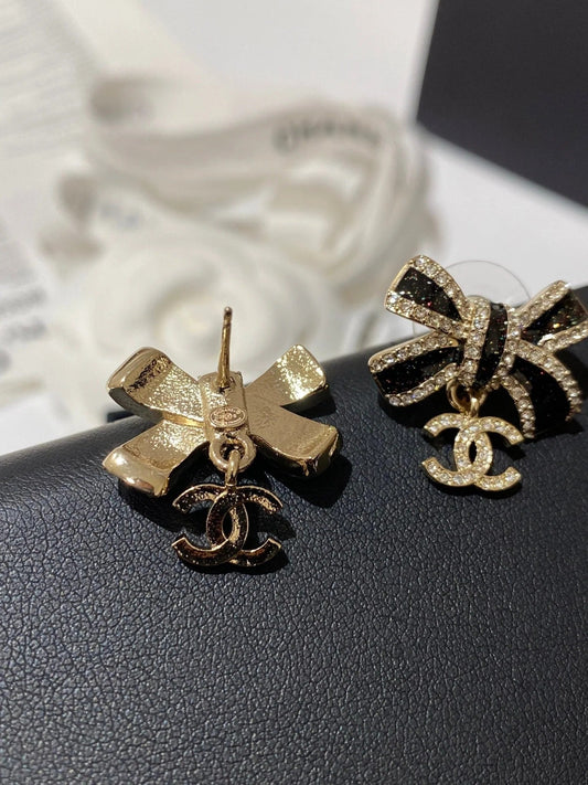 CC Crystals Black Enamel Bow Gold Earrings