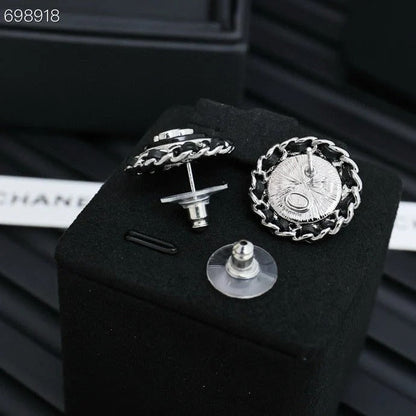 CC 25P STUD EARRINGS IN BLUE DENIM BLACK CALFSKIN-THREADED BUTTON