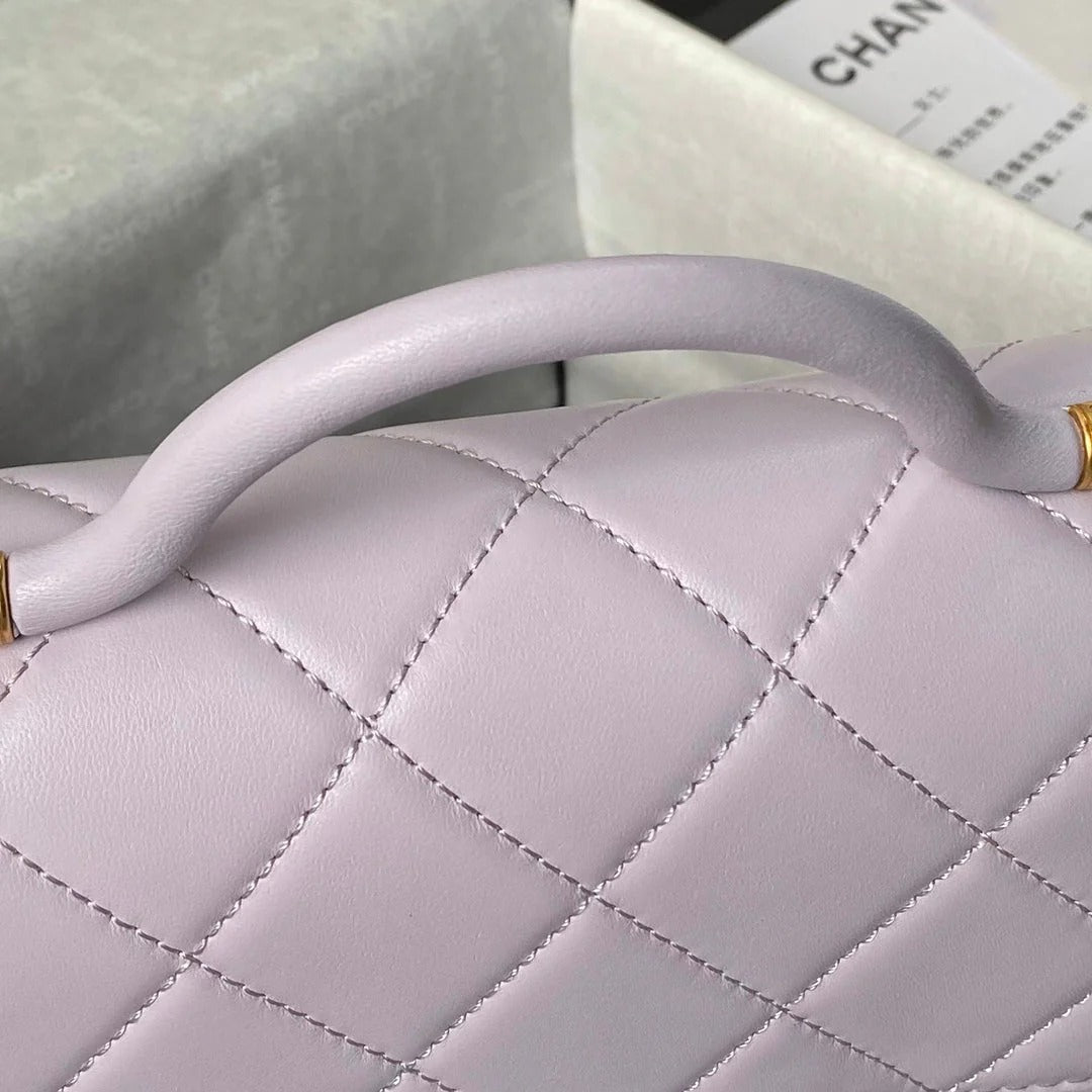 CC  25S FLAP BAG 21 CM IN LIGHT PURPLE LAMBSKIN WITH TOP HANDLE